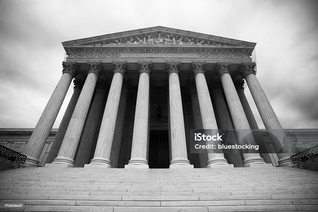 United States Supreme Court Wide-angle view of the United States Supreme Court Building in black and white. US Supreme Court Building Stock Photo