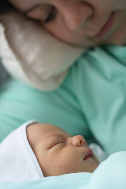 istock Mother with her newborn baby 172627288
