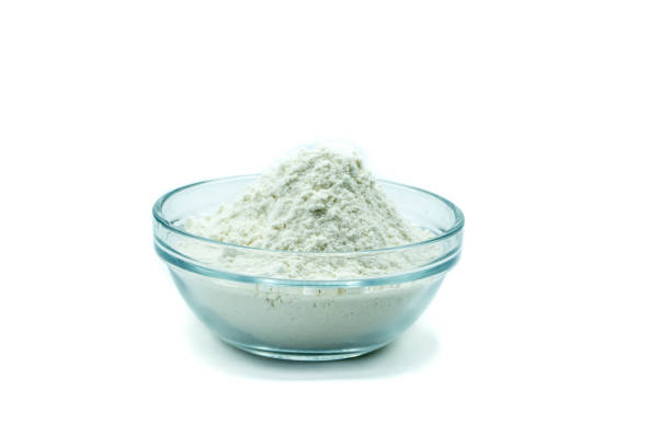istock Flour in glass bowl isolated on white background 1726273981