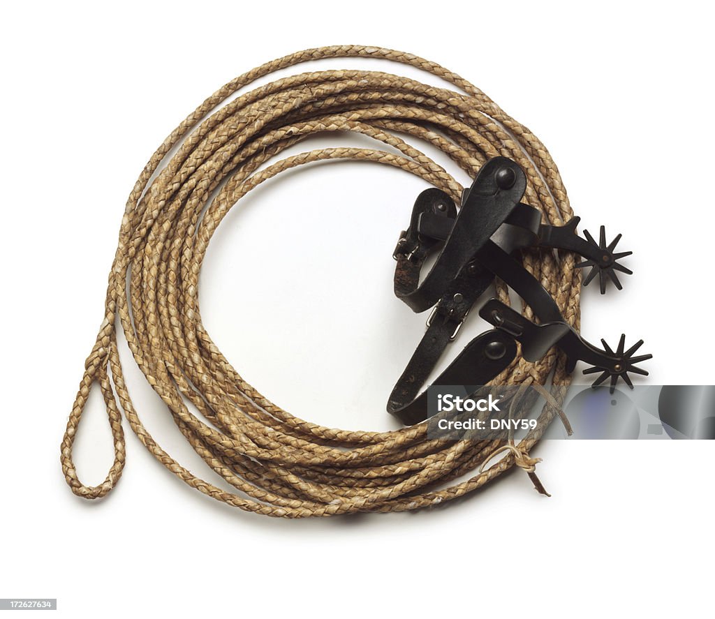 Lasso and Spurs Lasso and spurs on white background with soft shadow Rope Stock Photo