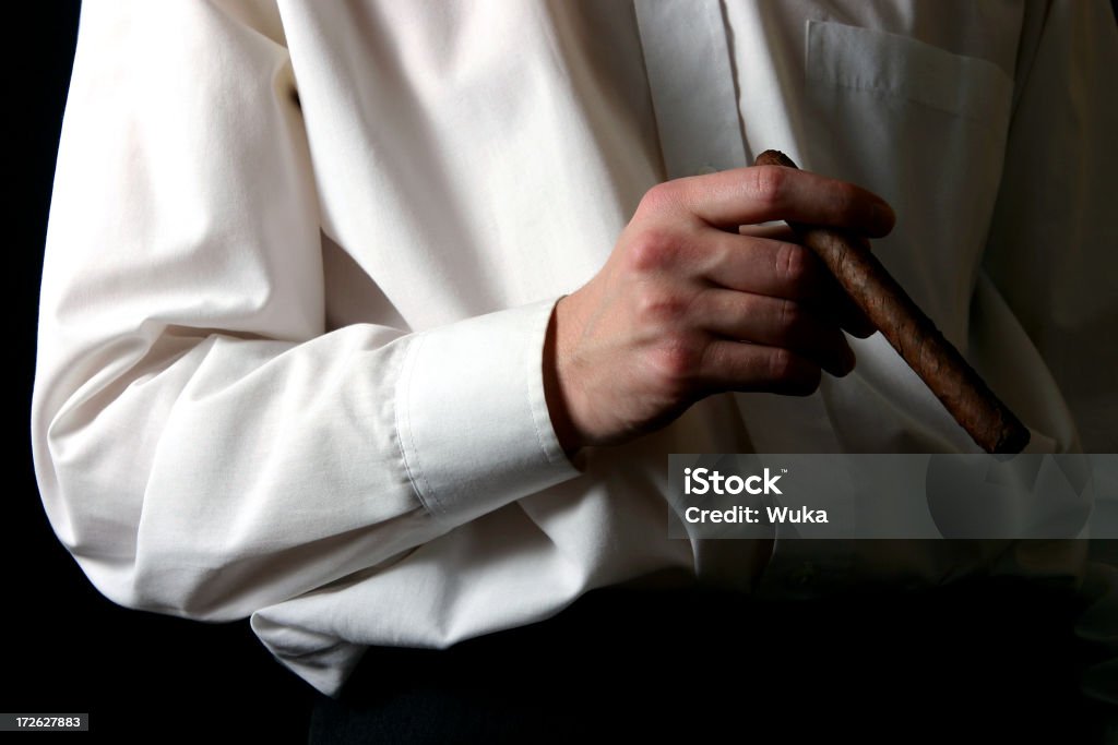 Man with cigar Man with cigar. Addiction Stock Photo