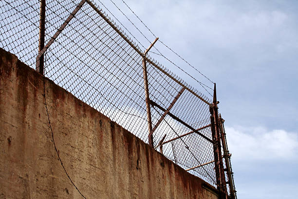 istock Jail Fence and Barbwires 172628284