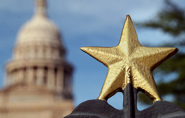 Texas Capitol View of the Texas Capitol from outside the ornate iron fence federal building photos stock pictures, royalty-free photos & images