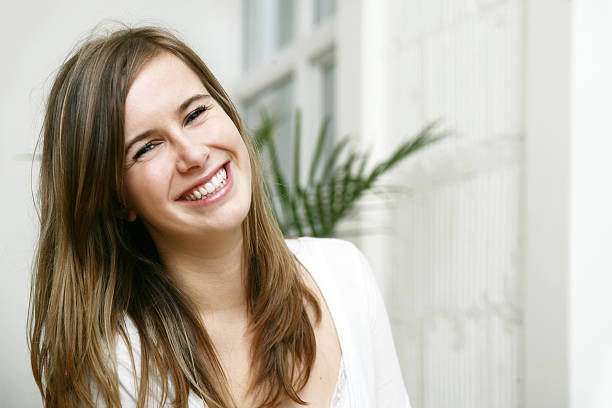 istock Laughing young woman 172628444
