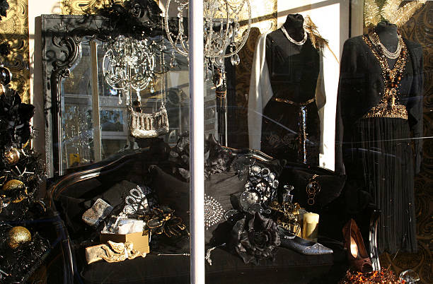 Dresses in womens clothes shop front window