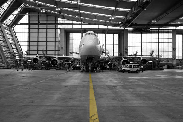 istock Airliner in hangar - black and white 172628571