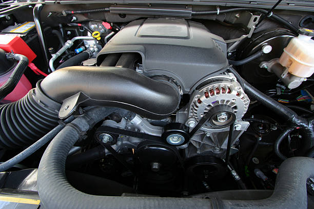 Engine Compartment The engine compartment of a new car. car motor stock pictures, royalty-free photos & images