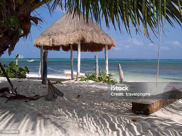 Beach Scene With Anchor And Fishing Hut Stock Photo - Download Image Now - Adventure, Anchor - Vessel Part, Anchored