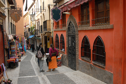 The old arab quarter of Granada is full of narrow alleyways with shops of food and spices and clothing boutiques