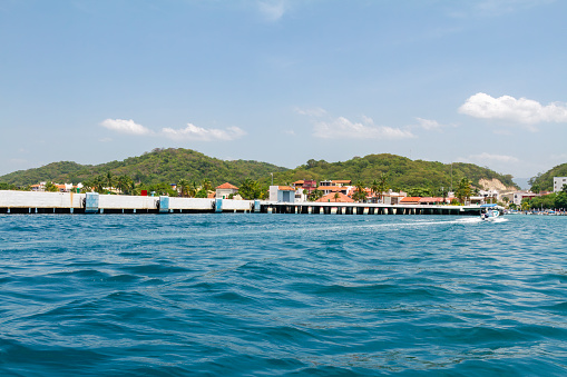 Huatulco Pier as seen from a recreational boat