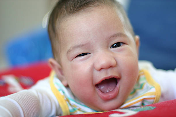 Baby Boy Laughing stock photo
