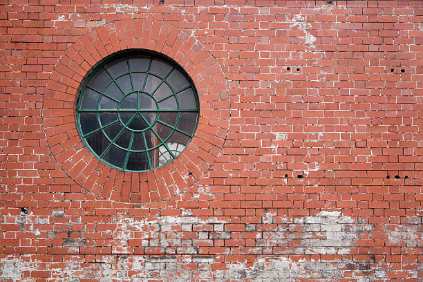 Circular Window in Brick Wall stock photo