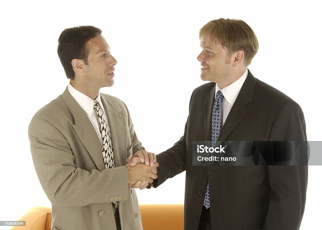 Sincere deal double handshake Adult Stock Photo