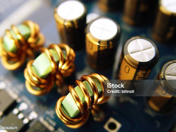 Closeup Of Capacitors And Ferrite Beads Stock Photo - Download Image Now - Abstract, CPU, Capacitor