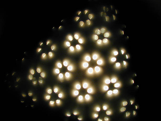 astratto luce - kaleidoscope dark flower lamp foto e immagini stock