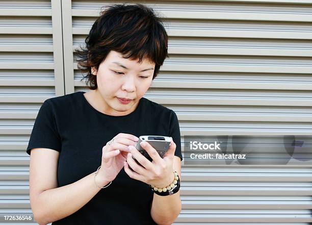 Pda User 3 Stock Photo - Download Image Now - Adult, Adults Only, Asia