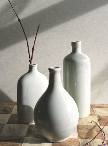 Three asian vases shot in evening light.