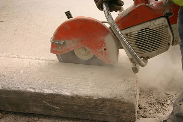 istock industrial saw cutting a kerb 172636860