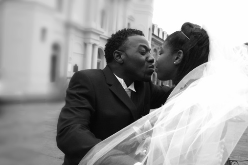 Artistic blurred African American Bridal couple.