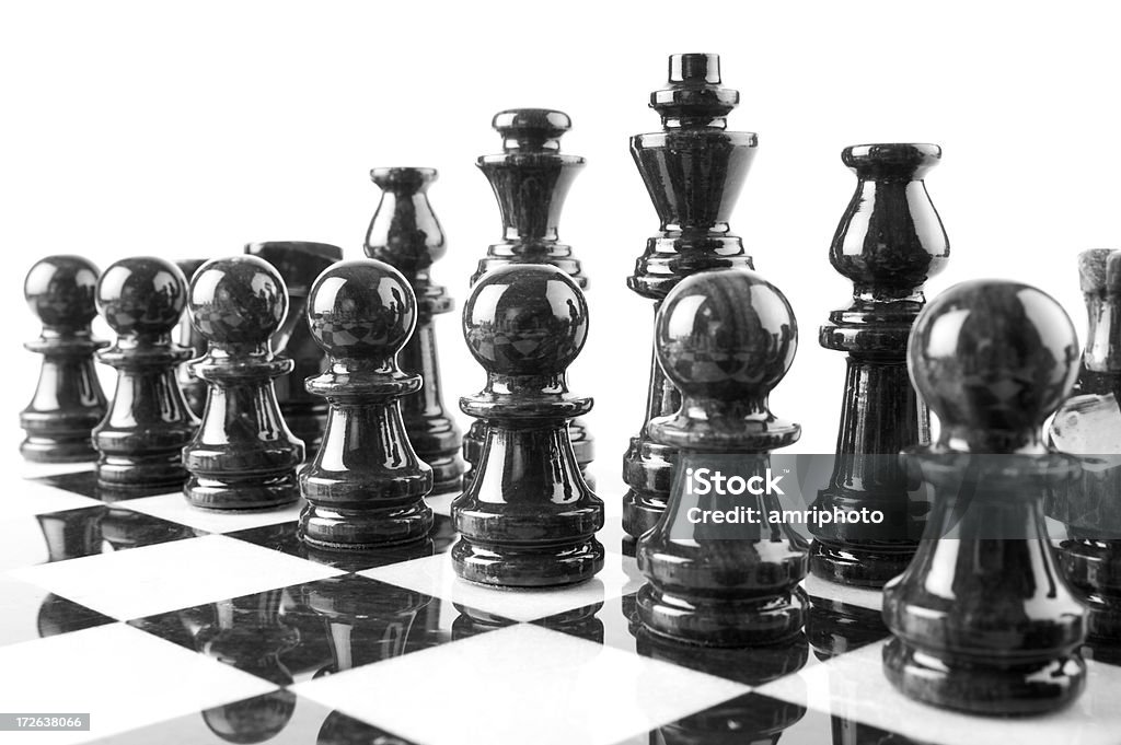 Pezzi di scacchi nera in marmo - Foto stock royalty-free di Affari