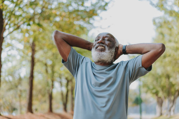 istock Senior man breathing outdoors in public park 1726381966