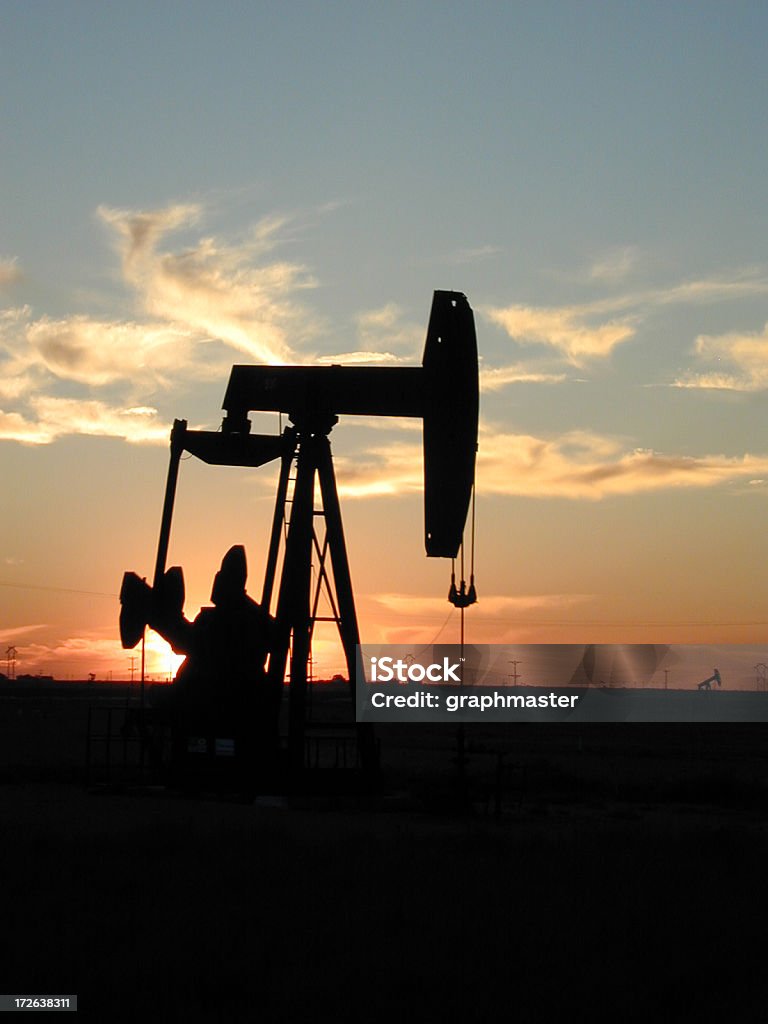Pompe Jack au Texas au coucher du soleil - Photo de Lieu touristique libre de droits