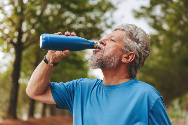 istock Portrait of a senior man drinking water exercising 1726383202