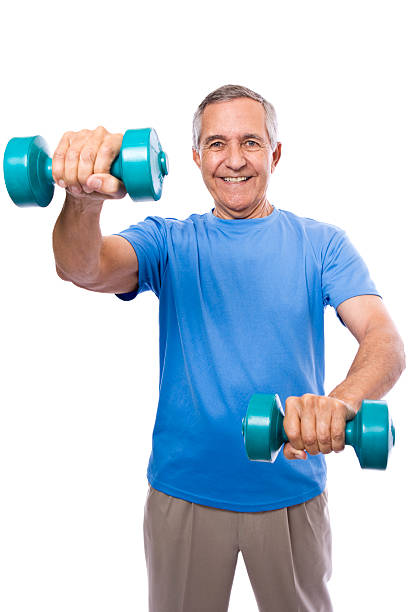 istock Senior man exercising with dumbbells 172638329