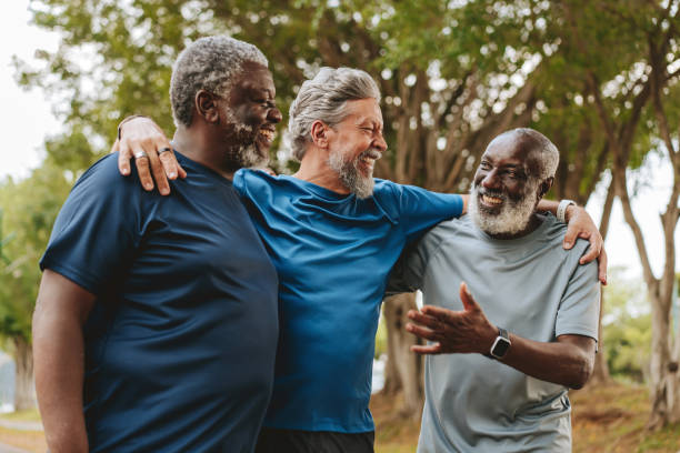 istock Elderly friends having fun while walking together 1726383466