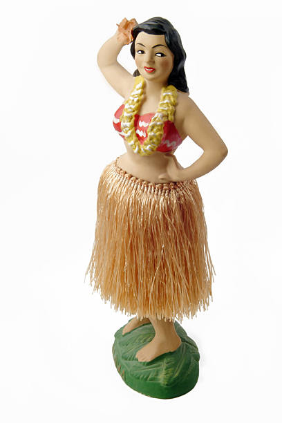 ノーヴェルティーアンティークフラガールのフィギュアを、白背景 - hula dancer retro revival hula dancing doll ストックフォトと画像