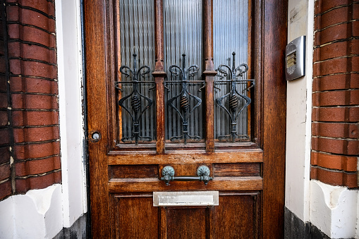 Door knocker on ancient metal door in Tbilisi, Georgia, close up