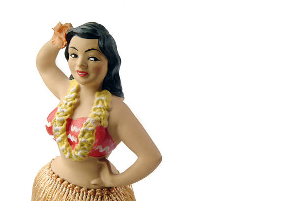 ノーヴェルティーアンティークフラガールのフィギュアを、白背景 - hula dancer retro revival hula dancing doll ストックフォトと画像