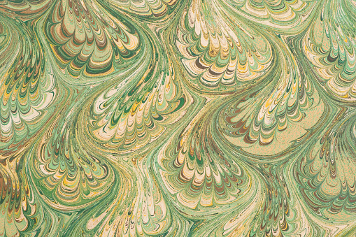 Marbled green paper.