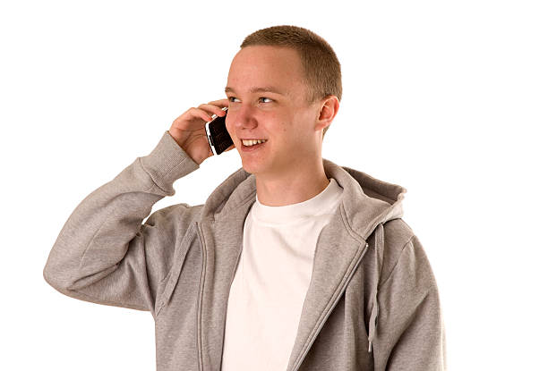 Teenager with mobile phone stock photo