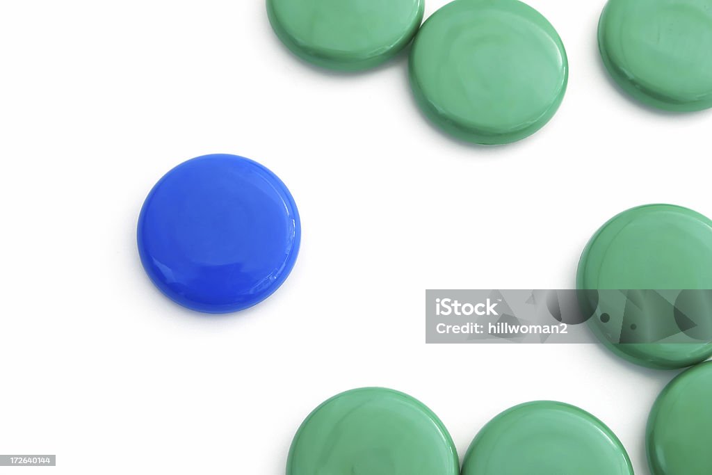 Single Blue Dot II "plastic dots shot in daylight, color not as saturated as Blue Dot I with white background Could show different, standing out from the crowd, etc." Bizarre Stock Photo