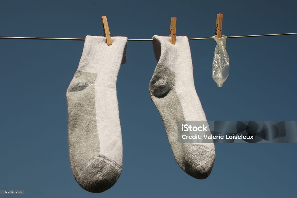 Kondom mit Socken - Lizenzfrei AIDS Stock-Foto