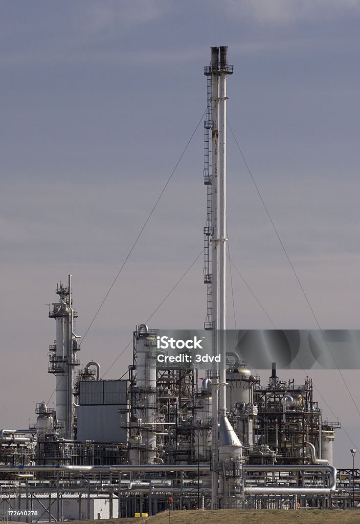 Chemical manufacturing plant Various components of a chemical manufacturing plant, including flare. Architectural Column Stock Photo