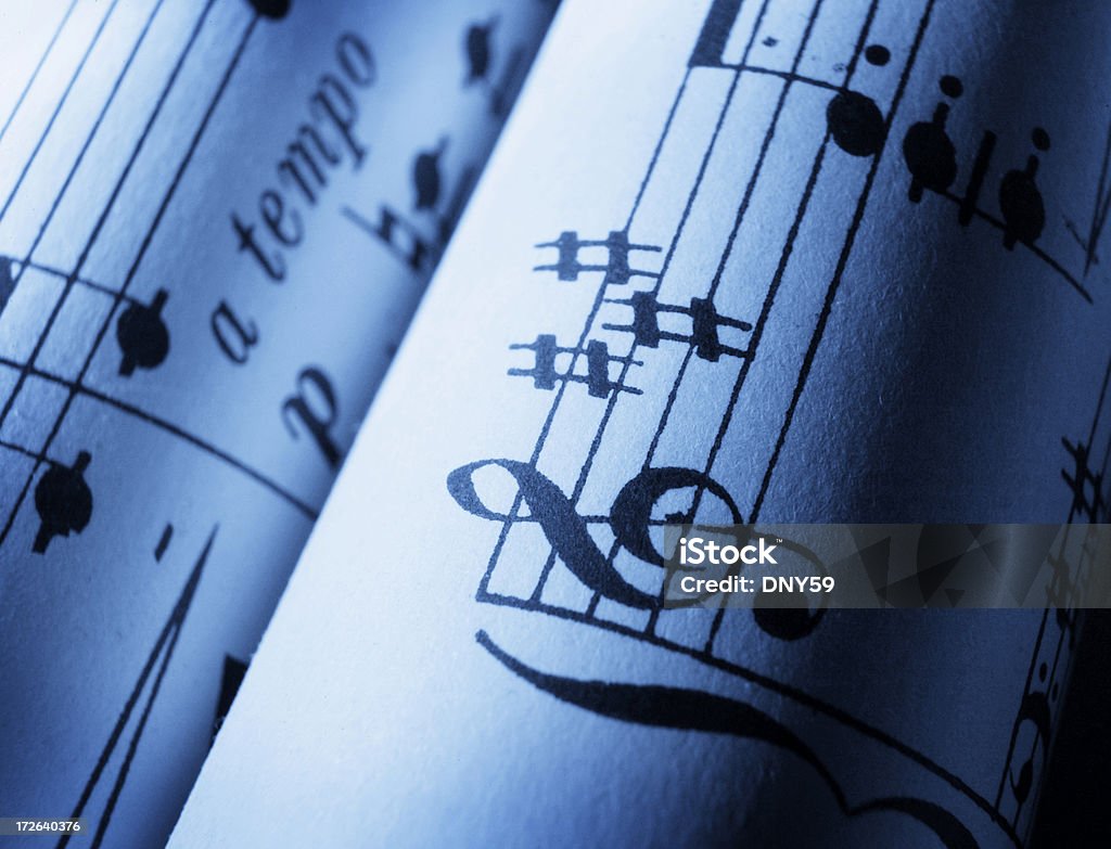 Sheet Music 10 Close up of rolls of sheet music Activity Stock Photo