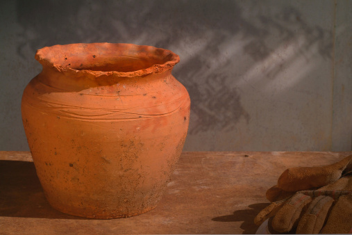 terracotta pot on workbench