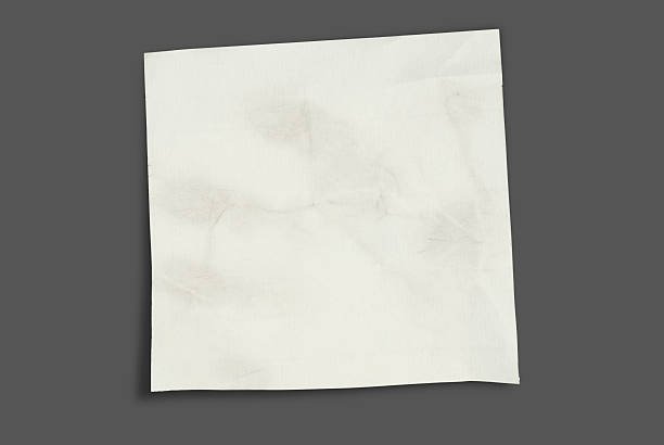 Dirty bright note isolated on gray stock photo