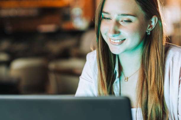 istock Happy freelancer sitting in a coffee shop and working on laptop 1726405280