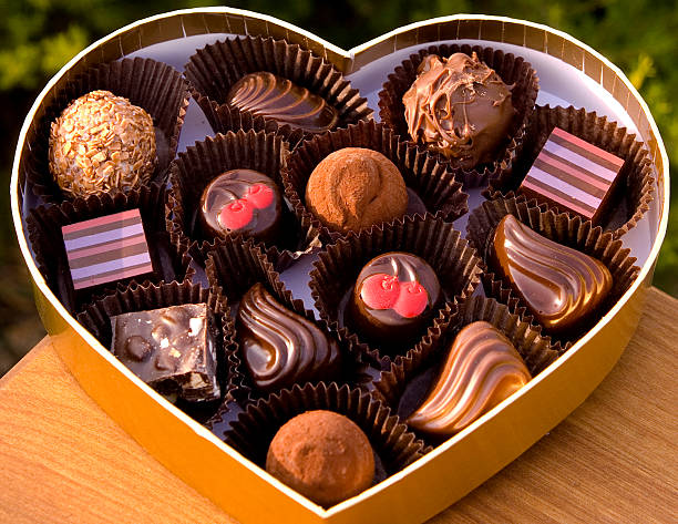 istock Chocolate Candy Truffles in Valentine's Day Heart Gift Box 172641181