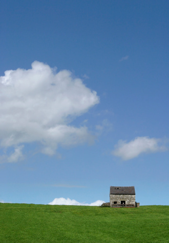 A small farm building on top of a small hill.See below for similar images from my portfolio: