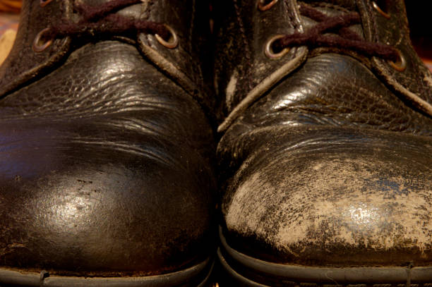 One shoe polished, one not stock photo