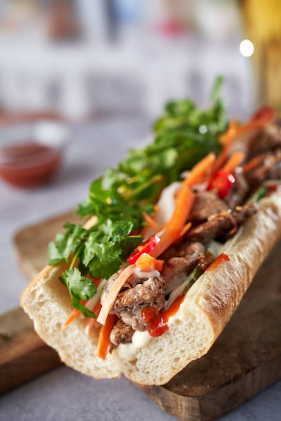 istock Thai Baguette Sandwich with Beef, Carrots, Cucumber and Cilantro 1726416327