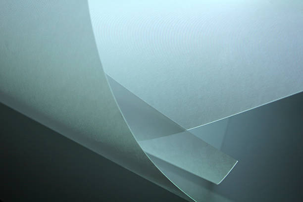 Graphic of curled edges of paper on gray stock photo