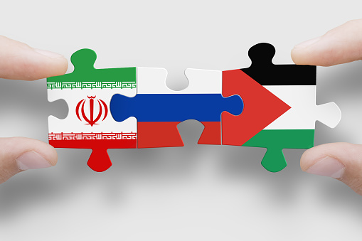 Puzzle made from flags of Iran,Russia, and Gaza. Gaza and Israel conflict. Terrorist organizations hezbollah and hamas