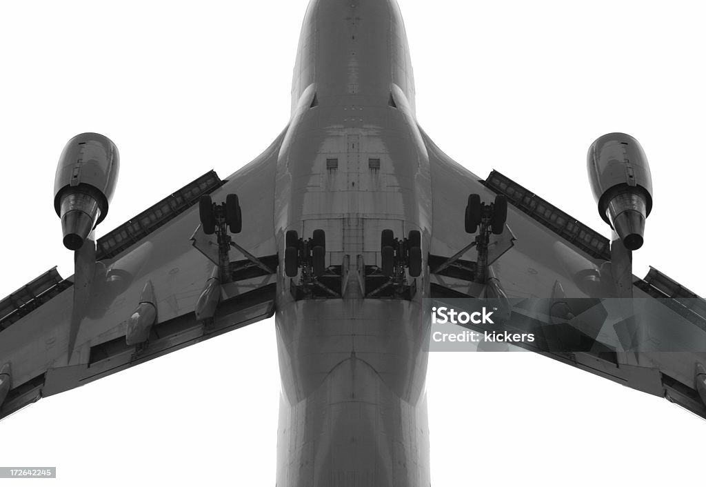 Airplane from below An airplane from below.  Isolated. Airplane Stock Photo