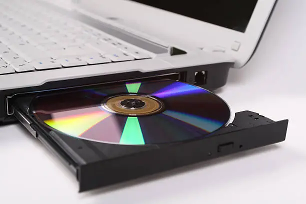 Laptop with open and loaded dvd drive