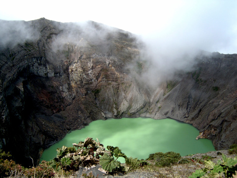 Volcano crater filed with phosphorus water